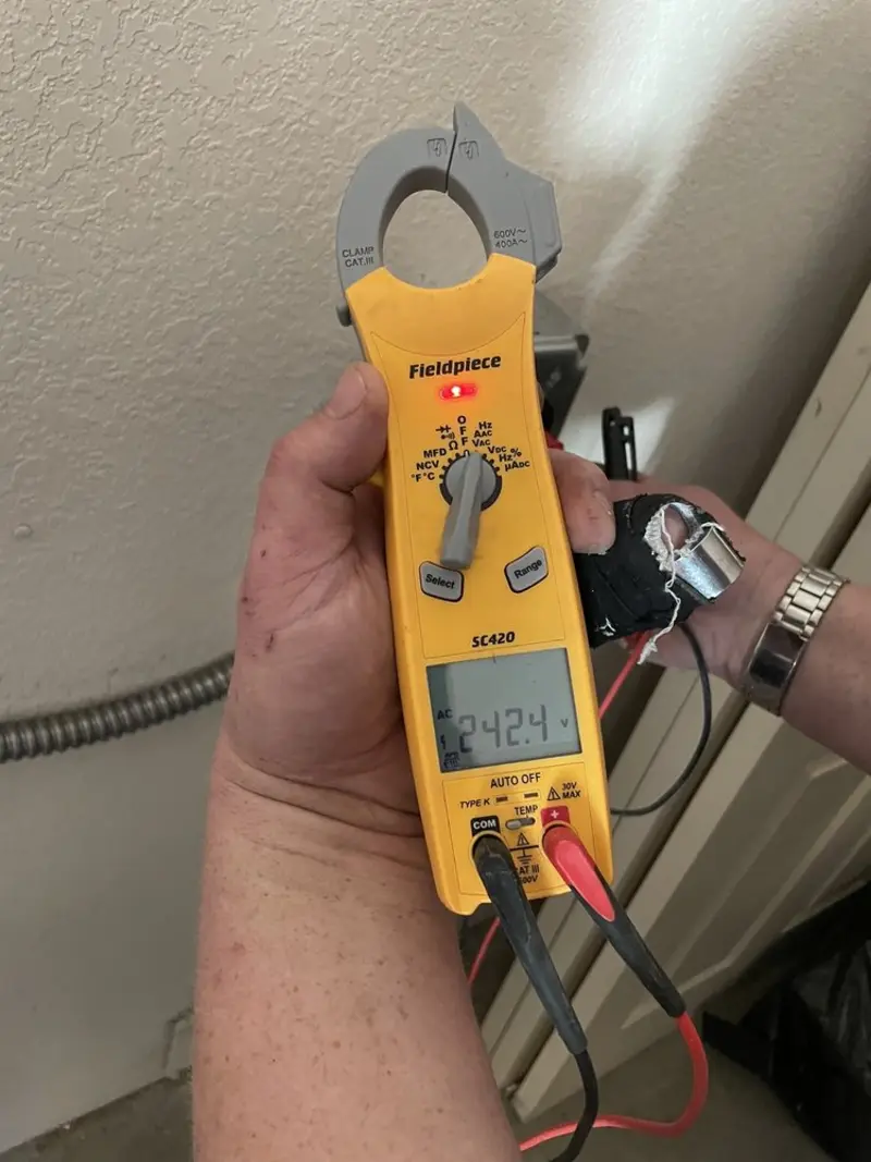 Voltage testing with clamp meter during Hot Tub / Pool Electrical Wiring in Evergreen